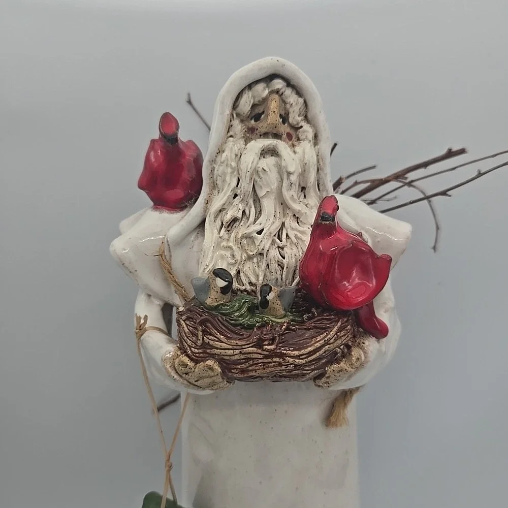 Tall White Coat Santa‎ Holding Cardinals And Bird Nest